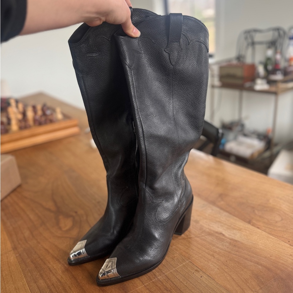 Sleek Black Leather Heeled Boots